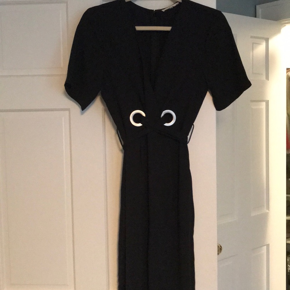 Black vneck jumpsuit with slight cropped flare leg